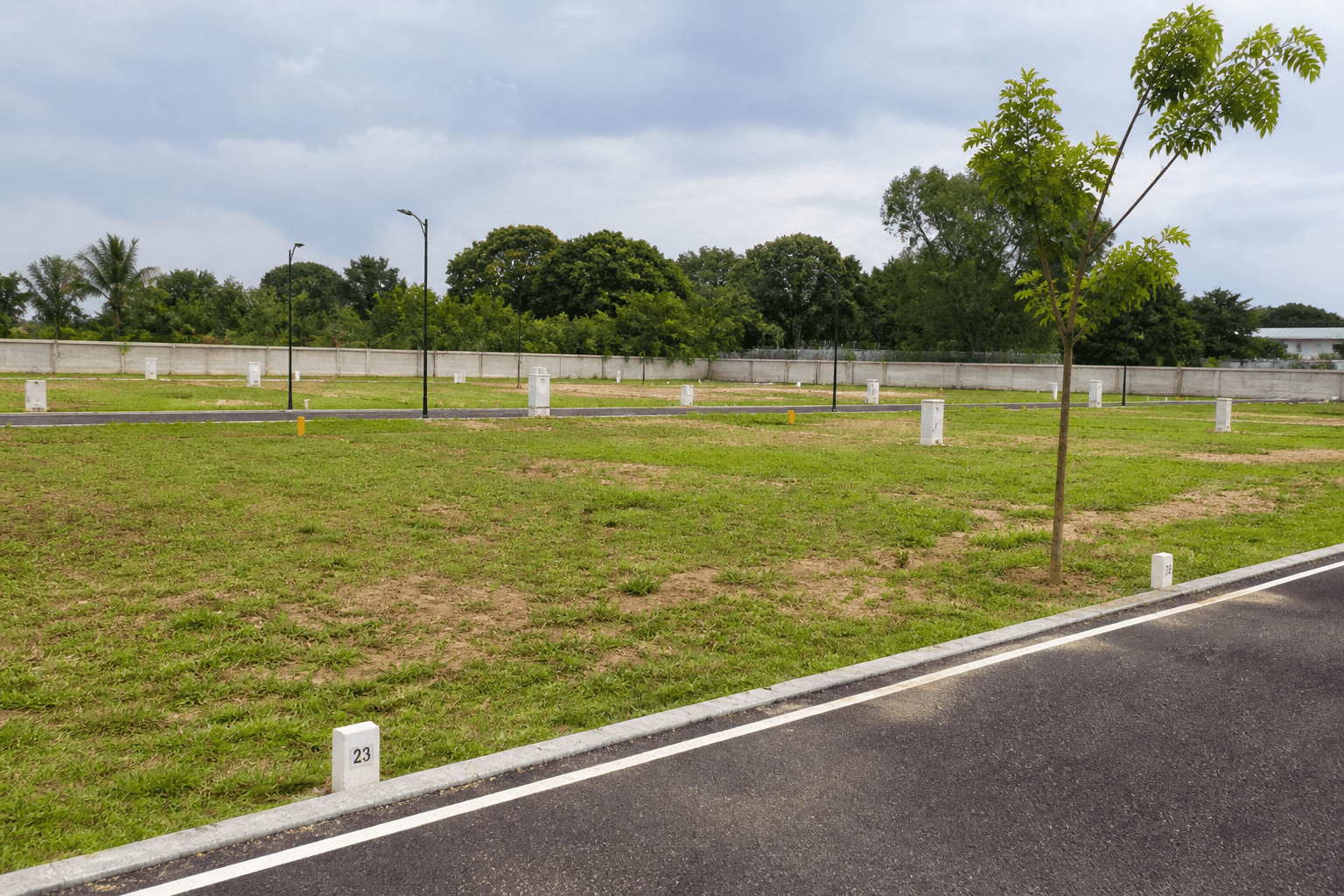 Adarsh Garden Estate Plot Resale residential plot layout with open land, internal roads and plot markings in Gattahalli Bangalore