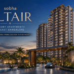 Luxury entrance view of sobha Altair premium apartment project in East Bangalore featuring modern high-rise towers, landscaped gardens, illuminated water features, and elegant architecture during sunset.