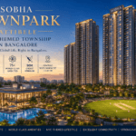 Luxury high-rise towers at Sobha Townpark with clubhouse, swimming pool, landscaped gardens, and cricket ground in Bengaluru