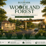 Bulwark The Woodland Forest premium plotted township entrance in Vijayapura Devanahalli North Bangalore with landscaped roads, green surroundings and modern infrastructure